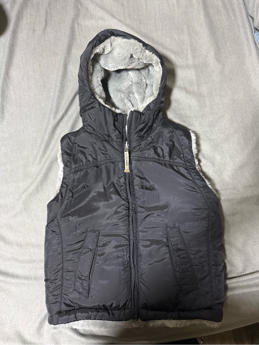 Women's Reversible Hooded Puffer Vest in Charcoal Gray and black